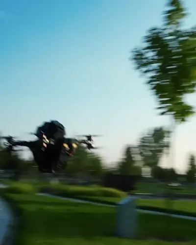 Andrii Shramko holding a multi-camera 360 drone prototype